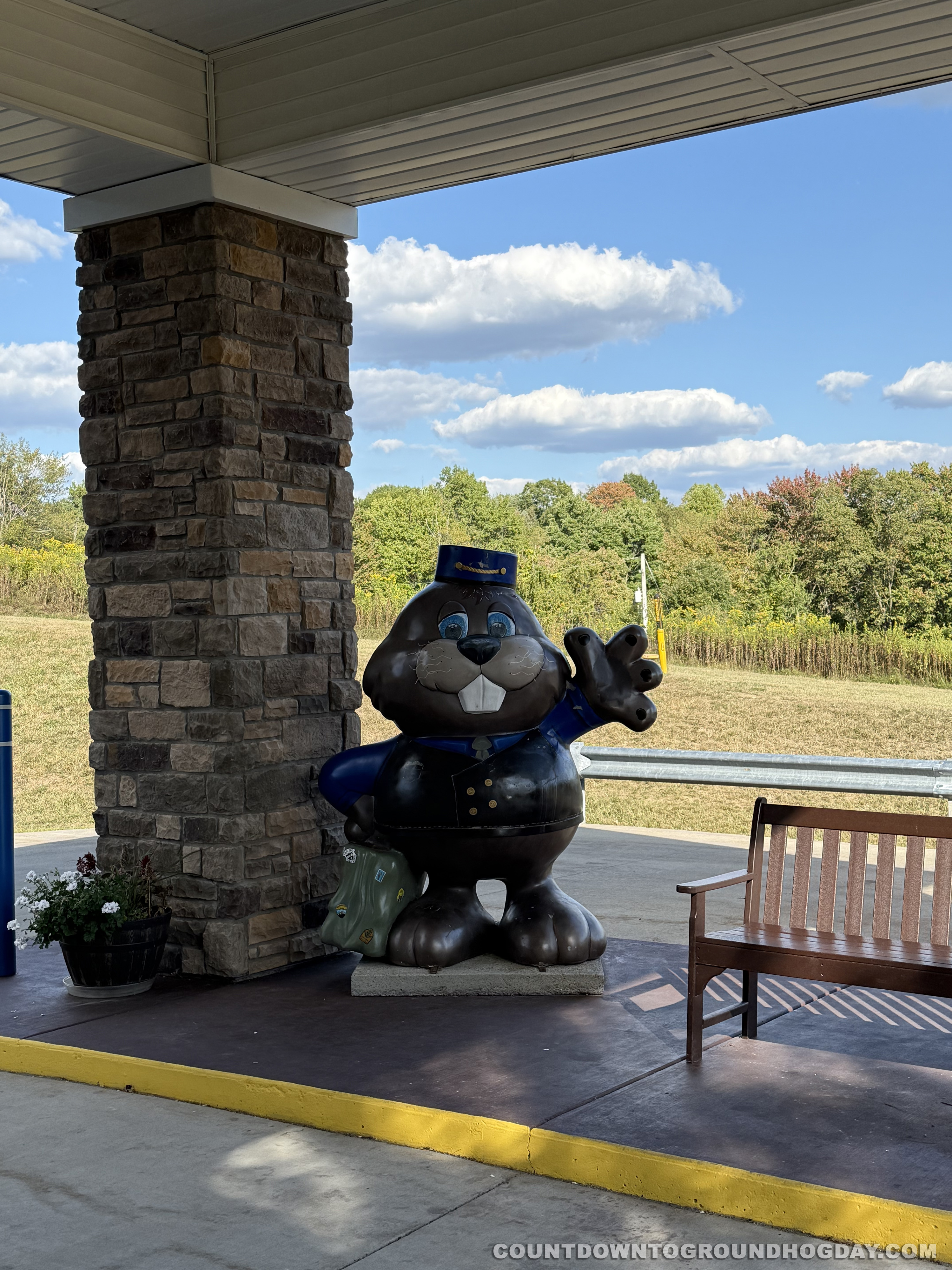 'Phil'd with Service' stands outside The Inn at Punxsutawney