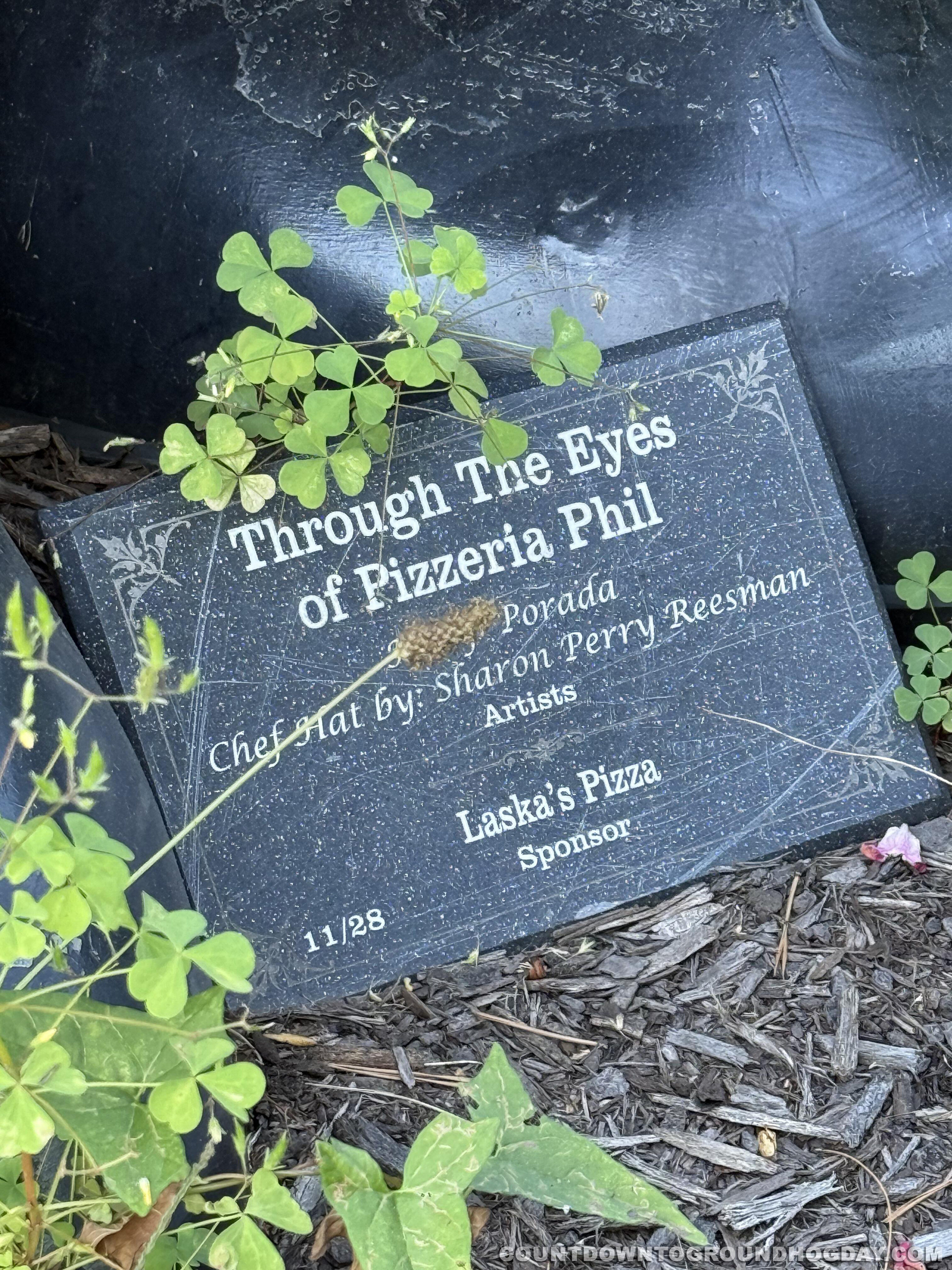 'Through the Eyes of Pizzeria Phil' inscription